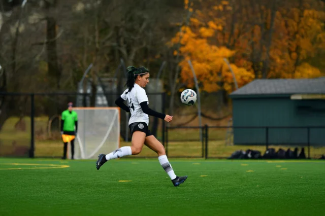 Asphalt Green Soccer Club player competing in a NYC girls soccer match.