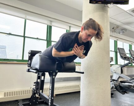 Asphalt Green Director of Fitness Nicole Lee performs a rep on the GHD Machine